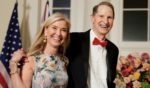 Oregon Sen. Ron Wyden and his wife, Nancy Wyden, arrive for a State Dinner at the Booksellers Room of the White House in Washington on Oct. 25.