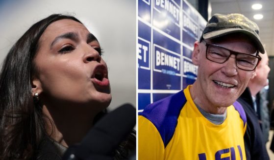 Rep. Alexandria Ocasio-Cortez speaks during a news conference outside the U.S. Capitol on Thursday in Washington, D.C. James Carville smiles during an event on Feb. 8, 2020, in Manchester, New Hampshire.