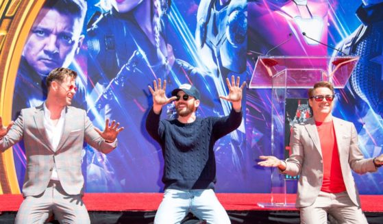 Actors. from left, Chris Hemsworth, Chris Evans and Robert Downey Jr. attend the Marvel Studios' "Avengers: Endgame" cast place their hand prints in cement at TCL Chinese Theatre IMAX Forecourt on April 23, 2019, in Hollywood.