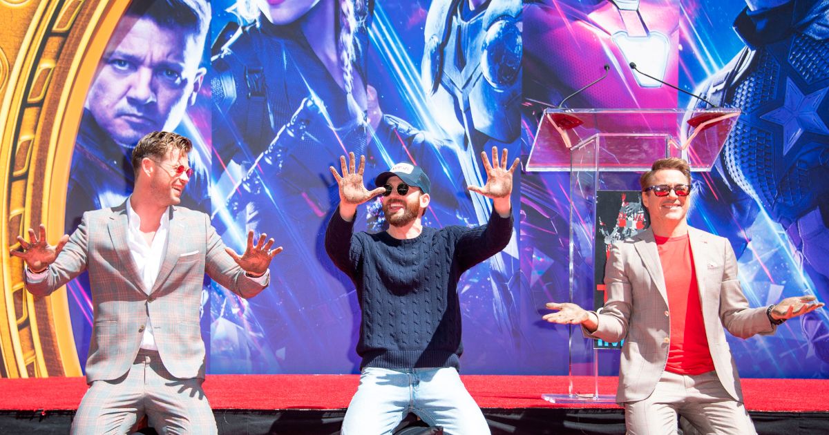 Actors. from left, Chris Hemsworth, Chris Evans and Robert Downey Jr. attend the Marvel Studios' "Avengers: Endgame" cast place their hand prints in cement at TCL Chinese Theatre IMAX Forecourt on April 23, 2019, in Hollywood.