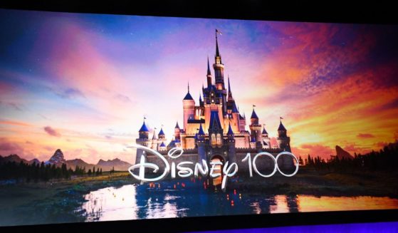 The Disney logo celebrating 100 years is displayed on stage during CinemaCon 2023 Disney studios presentation at Caesars Palace in Las Vegas, Nevada, on April 26, 2023.