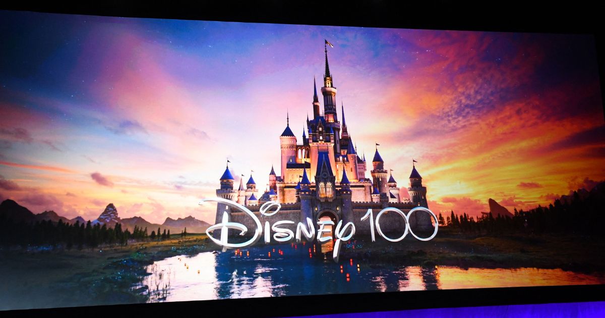 The Disney logo celebrating 100 years is displayed on stage during CinemaCon 2023 Disney studios presentation at Caesars Palace in Las Vegas, Nevada, on April 26, 2023.