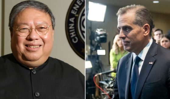 Patrick Ho, former Hong Kong home secretary and executive of the now-defunct Chinese energy giant CEFC, is pictured left in a 2015 file photo. Ho is threatening to sue Hunter Biden, right, for the return of a legal retainer he reportedly says Hunter did nothing to earn.
