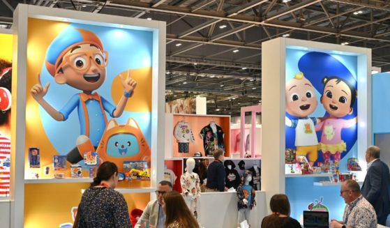 Posters showing Blippi and Cocomelon characters are displayed at the Moonbug Entertainment stand during the Brand Licensing Europe at ExCel on October 4, 2023 in London, England.