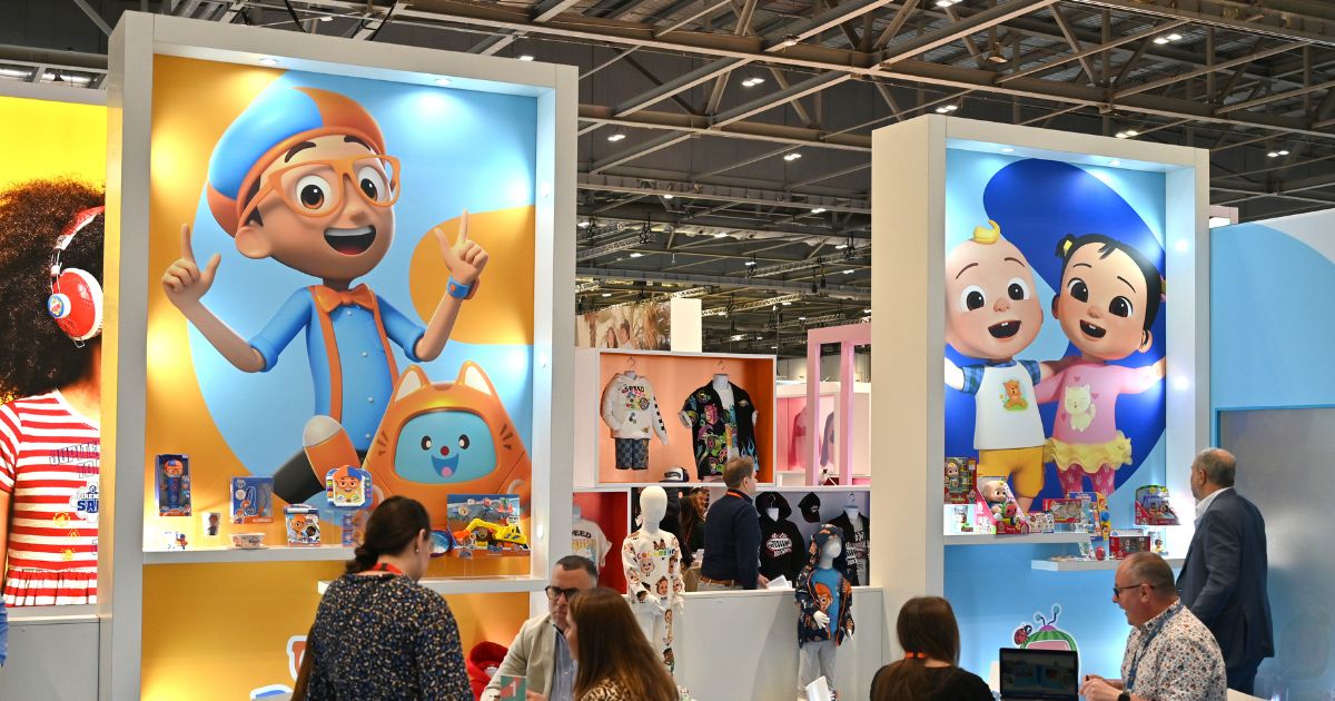 Posters showing Blippi and Cocomelon characters are displayed at the Moonbug Entertainment stand during the Brand Licensing Europe at ExCel on October 4, 2023 in London, England.