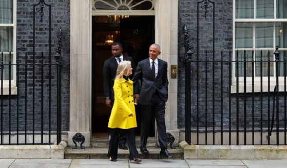 Former President Barack Obama and U.S. Ambassador Jane Hartley leave the London residence of British Prime Minister Rishi Sunak on Monday after a meeting between Obama and Sunak.