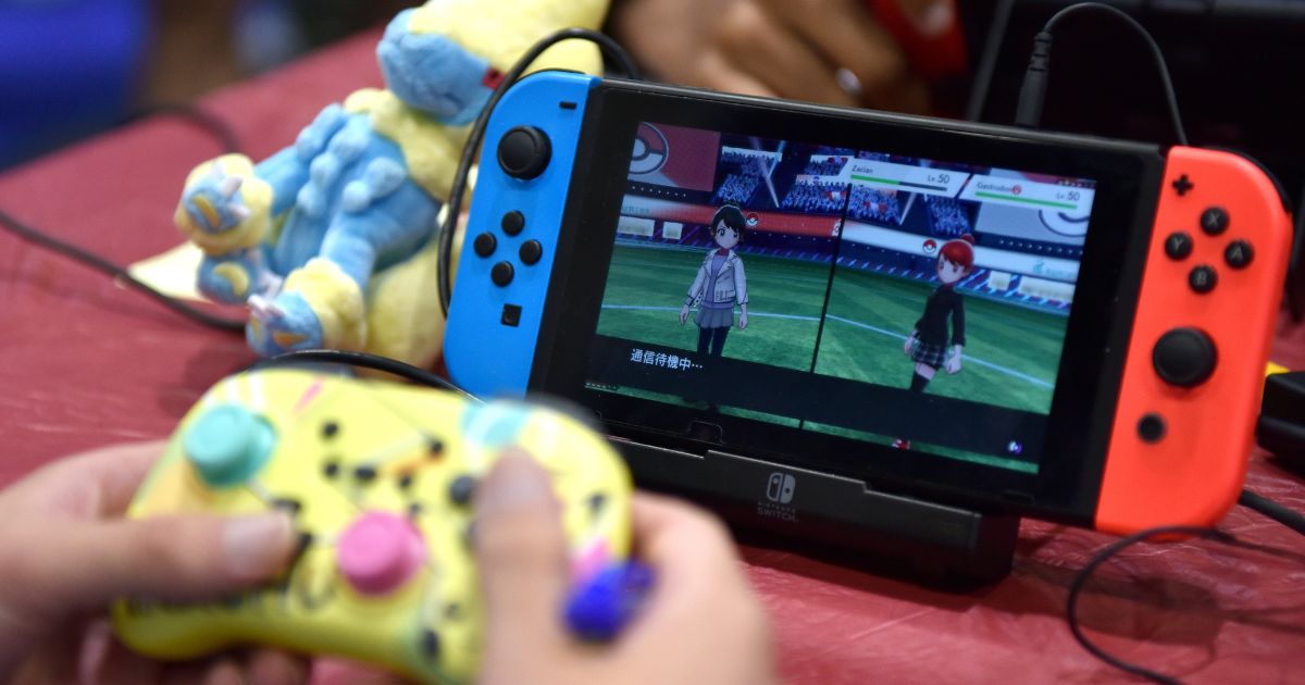 A competitor plays Pokemon on a Nintendo Switch console during the 2022 Pokémon World Championships at ExCel on August 18, 2022, in London, England.