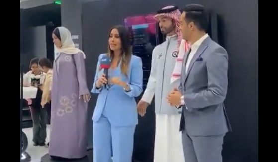 The Saudi robot Muhammad reaches for a reporter's backside.