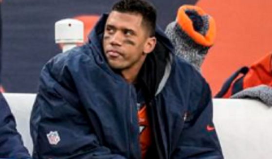 Denver Broncos quarterback Russell Wilson, pictured on the bench during a Dec. 31 game against the Los Angeles Chargers.