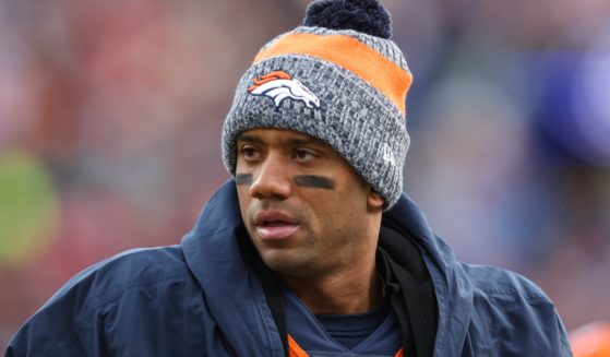 Quarterback Russell Wilson, pictured in a Dec. 31, 2023 file photo, has been released by the Denver Broncos -- at a huge cost to the team.