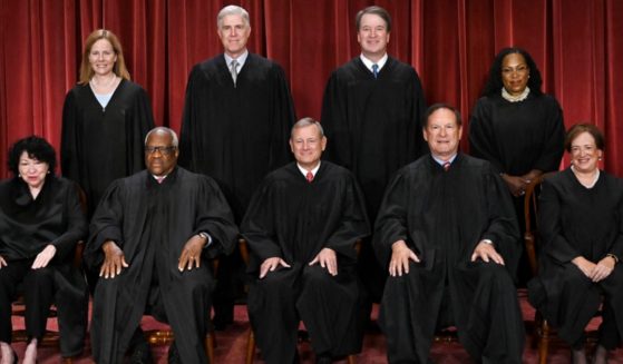 Supreme Court are pictured in their official photo in October 2022. Seated, from left: Associate Justice Sonia Sotomayor, Associate Justice Clarence Thomas, Chief Justice John Roberts, Associate Justice Samuel Alito and Associate Justice Elena Kagan. Standing, from left:  Associate Justice Amy Coney Barrett, Associate Justice Neil Gorsuch, Associate Justice Brett Kavanaugh and Associate Justice Ketanji Brown Jackson.