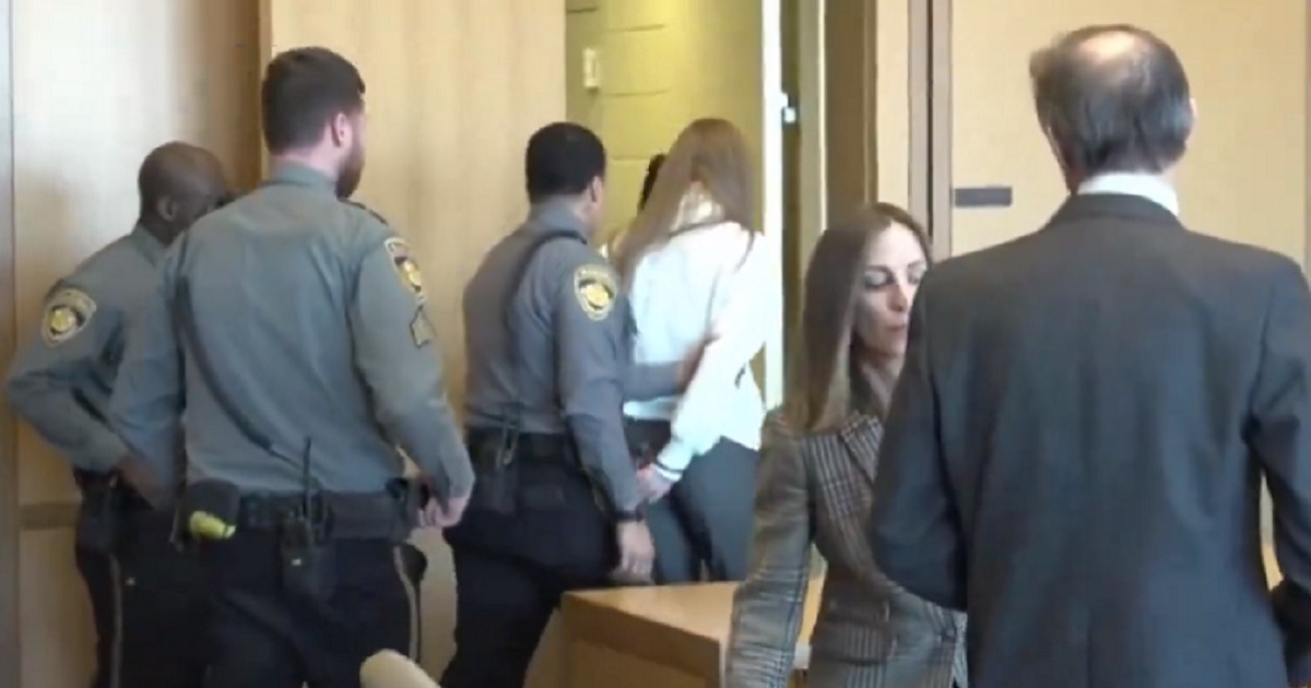 Former ESPN host Michelle Troconis is escorted from the courtroom Friday after being convicted in the murder of a woman in New Canaan, Connecticut, in 2019.