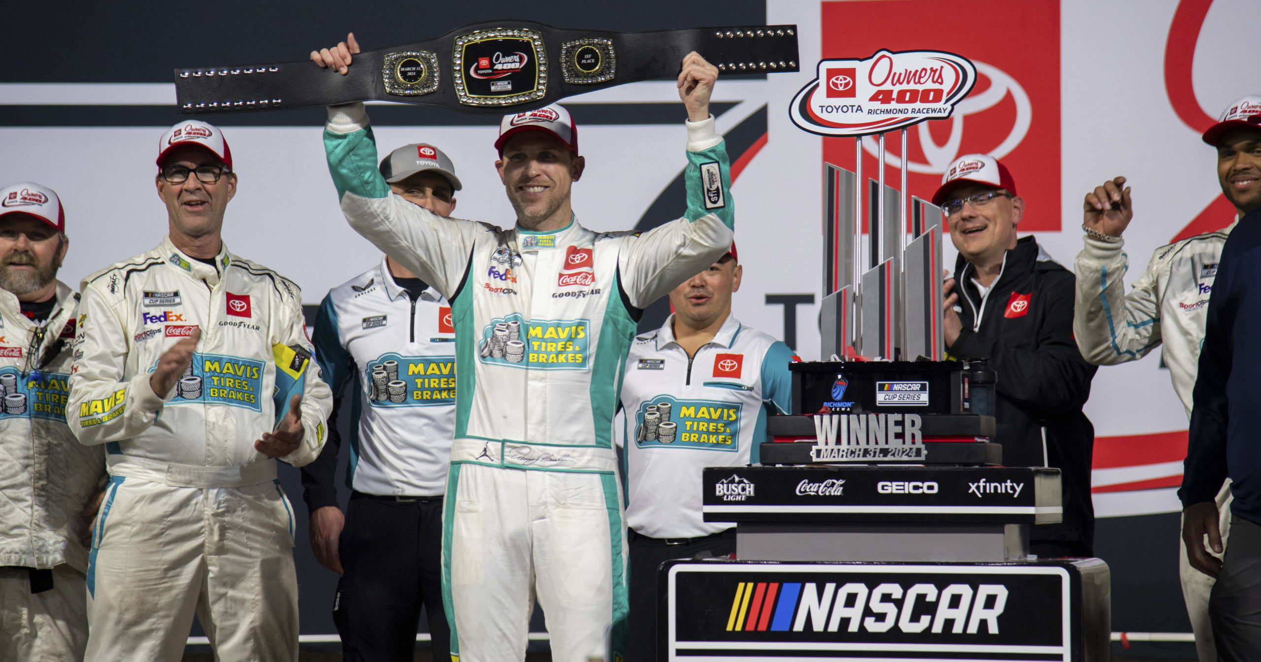 Denny Hamlin celebrates after winning a NASCAR Cup Series race at Richmond Raceway in Richmond, Virginia, on Sunday.