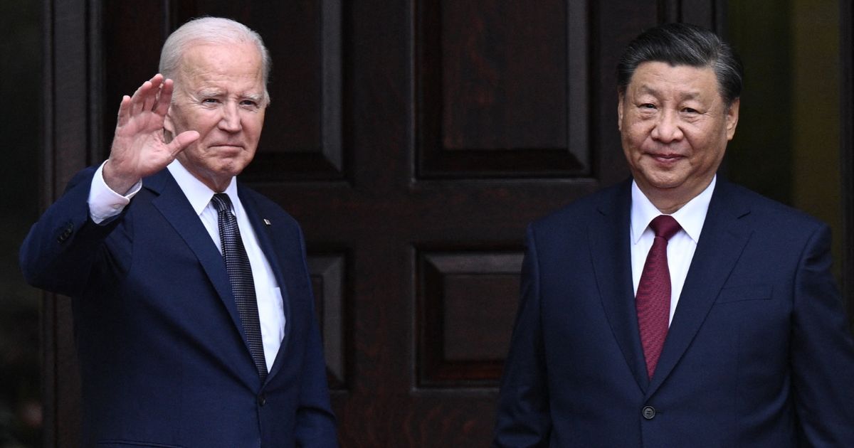 President Joe Biden greets Chinese President Xi Jinping before a meeting in Woodside, California on Nov. 15, 2023.