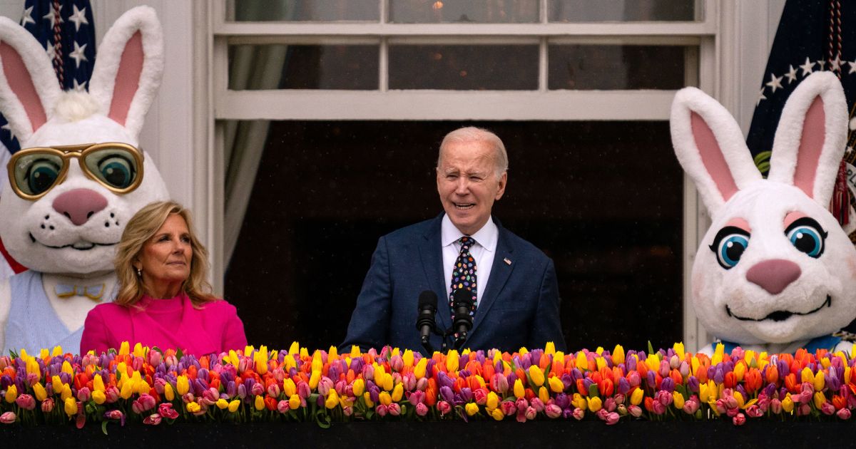 First lady Jill Biden listens as President Joe Biden delivers remarks during the annual White House Easter Egg Roll on the South Lawn of the White House in Washington on Monday.