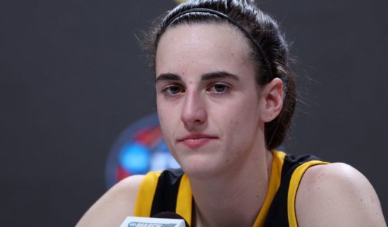 Caitlin Clark of the Iowa Hawkeyes speaks with the media after losing to the South Carolina Gamecocks in the 2024 NCAA Women's Basketball Tournament National Championship in Cleveland, Ohio, on Sunday.