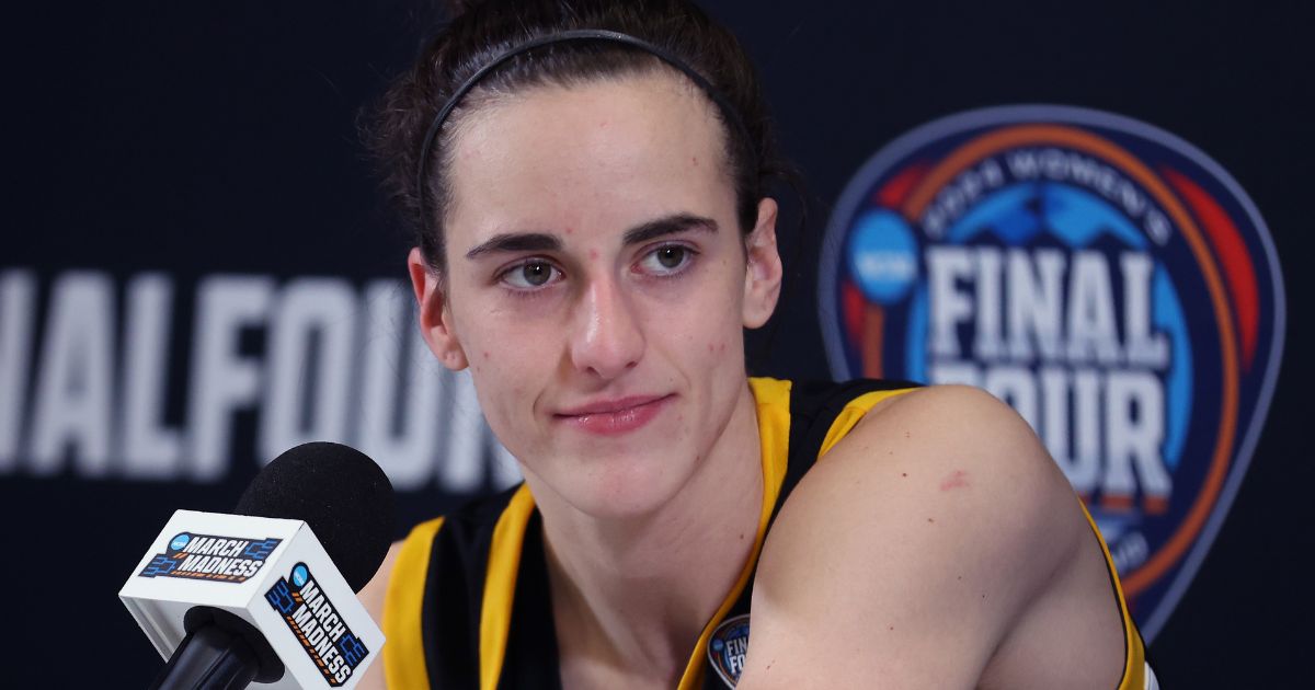Caitlin Clark of the Iowa Hawkeyes talks with the media after losing to the South Carolina Gamecocks in the 2024 NCAA Women's Basketball Tournament National Championship in Cleveland, Ohio, on Sunday.