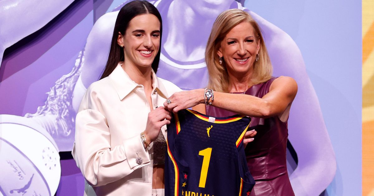 Caitlin Clark poses with WNBA Commissioner Cathy Engelbert after being selected first overall pick by the Indiana Fever during the 2024 WNBA Draft in New York City on Monday.