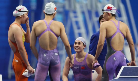 Chinese swimmers -- gold medalist Zhang Yufei, Li bingjie, Wu Qingfeng and Yang Junxuan -- prepare to compete in the Women's 4X100m Freestyle Relay Finals during the Hangzhou 2022 Asian Games in Hangzhou, China, on Sept. 24, 2023.