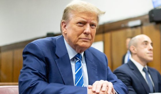 Former President Donald Trump sits in the courtroom during the second day of his criminal trial at Manhattan Criminal Court in New York City on Tuesday.