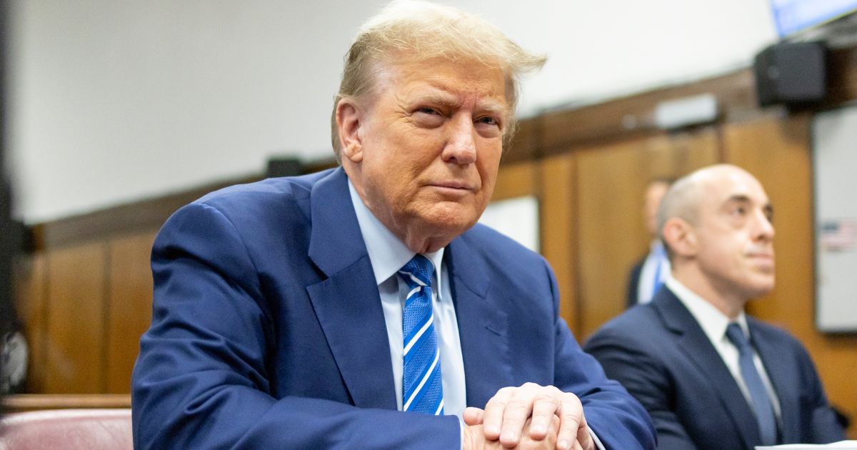 Former President Donald Trump sits in the courtroom during the second day of his criminal trial at Manhattan Criminal Court in New York City on Tuesday.
