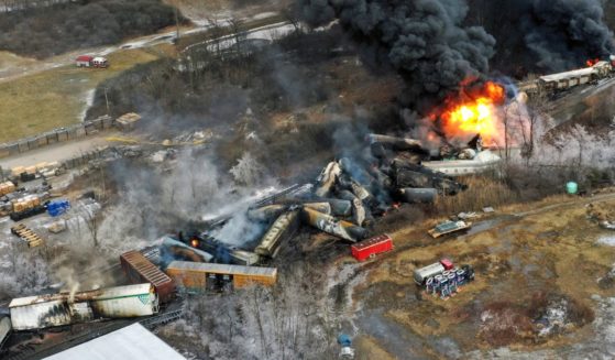 A Norfolk Southern freight train that derailed near East Palestine, Ohio, on Feb. 3, 2023, remained on fire the following day.