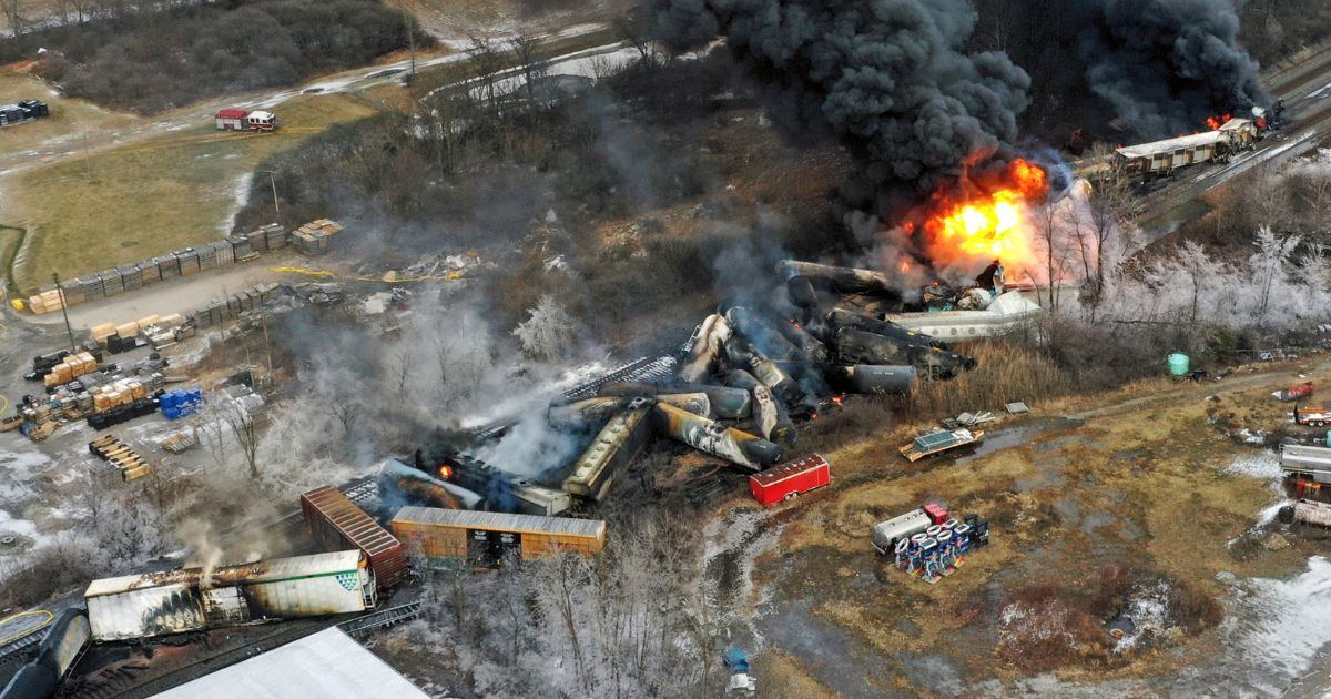 A Norfolk Southern freight train that derailed near East Palestine, Ohio, on Feb. 3, 2023, remained on fire the following day.