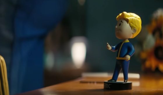 The iconic Vault-Tec bobblehead figure from the Fallout franchise as shown in the Prime Video "Fallout" television series.