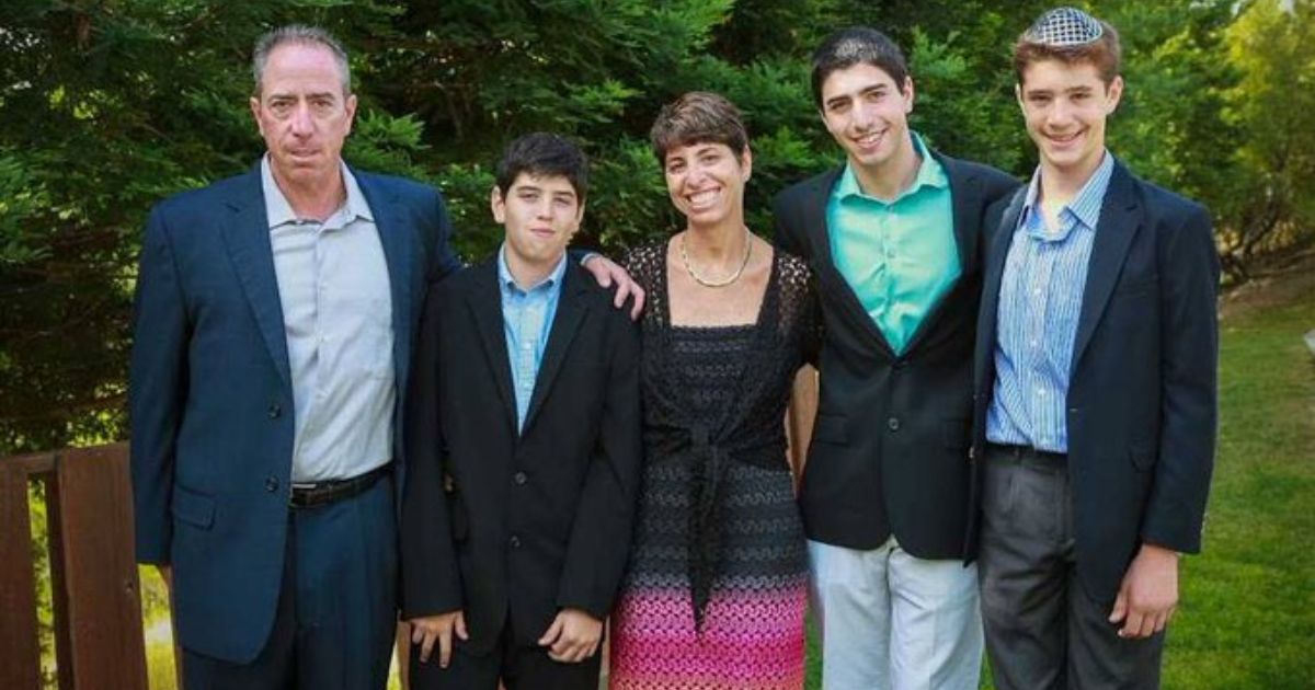 Liron and Naomi Petrushka are seen with their three sons.