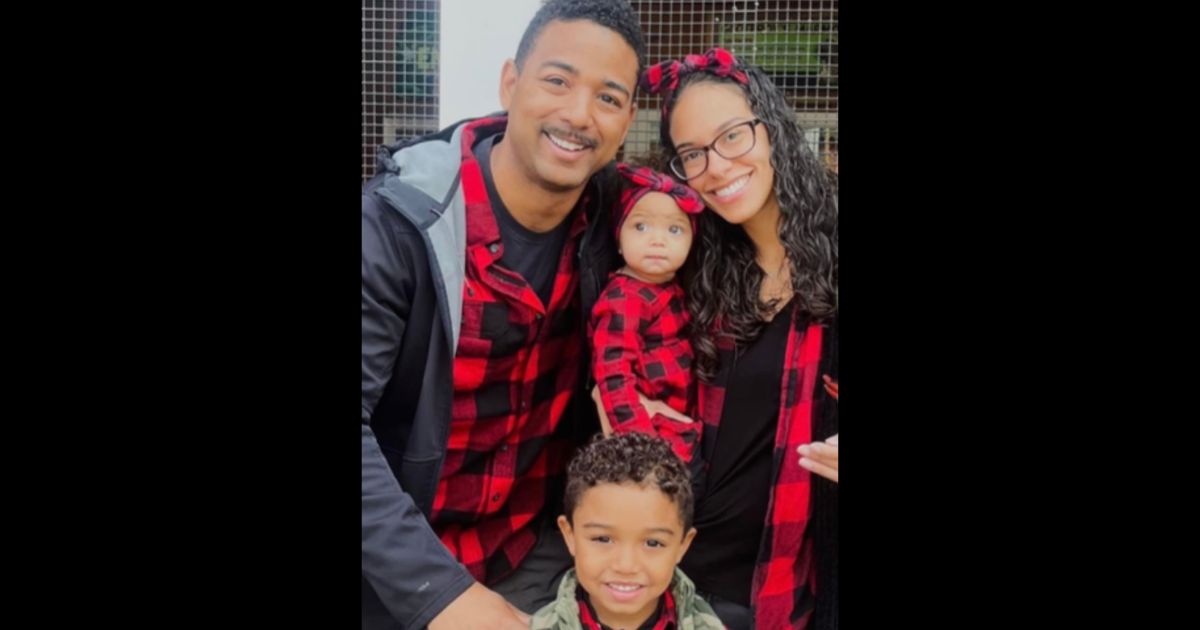New York firefighter Derek Floyd is seen with his wife, Cristine, and two children.