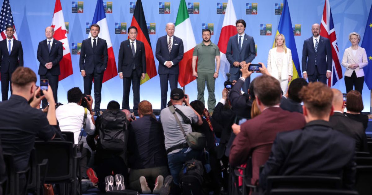 (From L to R) British Prime Minister Rishi Sunak, German Chancellor Olaf Scholz, French President Emmanuel Macron, Japanese Prime Minister Fumio Kishida, U.S. President Joe Biden, Ukrainian President Volodomyr Zelenskyy, Canadian Prime Minister Justin Trudeau, Italian Prime Minister Giorgia Meloni, President of the European Council Charles Michel and President of the European Commission Ursula von der Leyen pose for a group photo following the announcement of the G7 nations' joint declaration for the support of Ukraine on July 12 in Vilnius, Lithuania.
