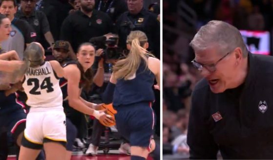 With just over three seconds left in the game, officials called a foul on the University of Connecticut, which led to a 71-69 loss against the University of Iowa in Friday's Final Four game. UConn coach Geno Auriemma, at right, protested the call.