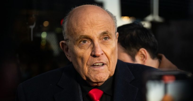 Rudy Giuliani speaks to reporters in Manchester, New Hampshire, on Jan. 21.