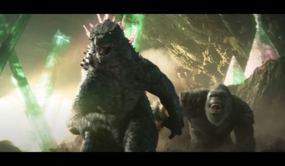 The two titular characters of the 2024 film "Godzilla X Kong: The New Empire" running towards the camera.