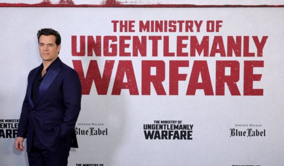 Actor Henry Cavill posing for pictures at the New York Premiere for "The Ministry of Ungentlemanly Warfare."