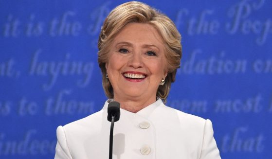 Then-Democratic presidential nominee Hillary Clinton smiles during the final presidential debate against then-Republican candidate Donald Trump in Las Vegas, Nevada on Oct. 19, 2016.