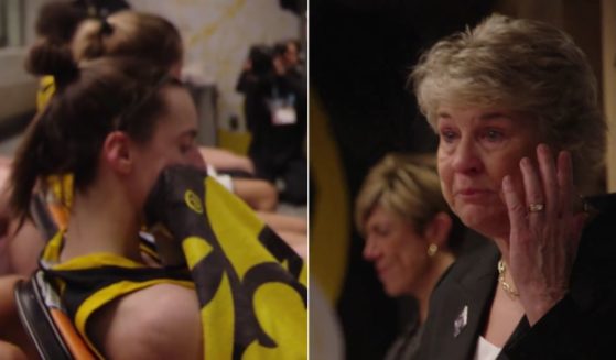 Iowa Hawkeyes women's basketball coach Lisa Bluder, right, gave a passionate speech to her team after their loss to South Carolina in the national championship game on Sunday.