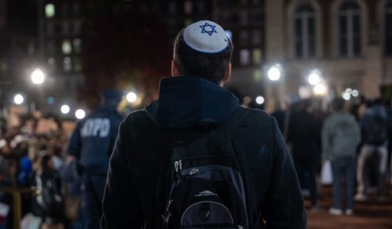 A Jewish student watches a pro-Palestinian demonstration on the Columbia University campus in New York on Nov. 14.