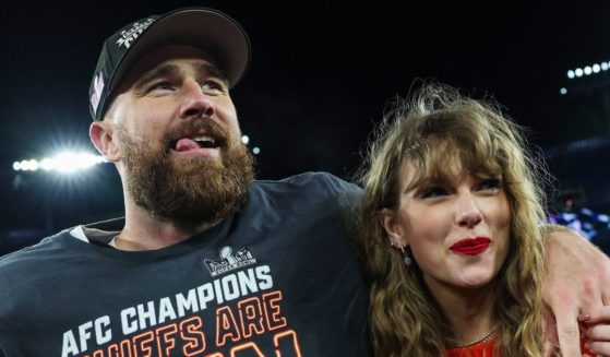 Travis Kelce, left, of the Kansas City Chiefs celebrates with Taylor Swift, right, after defeating the Baltimore Ravens in the AFC Championship Game in Baltimore, Maryland, on Jan. 28.