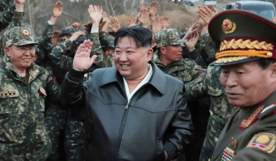 In a photo provided by the North Korean government, North Korean leader Kim Jong Un, center, is surrounded by solders during a visit to his top tank group, the Seoul Ryu Kyong Su Guards 105th Tank Division, in North Korea on March 24This photo provided by the North Korean government, North Korean leader Kim Jong Un, center, is surrounded by solders during his visit to his top tank group, the Seoul Ryu Kyong Su Guards 105th Tank Division, in North Korea on March 24.