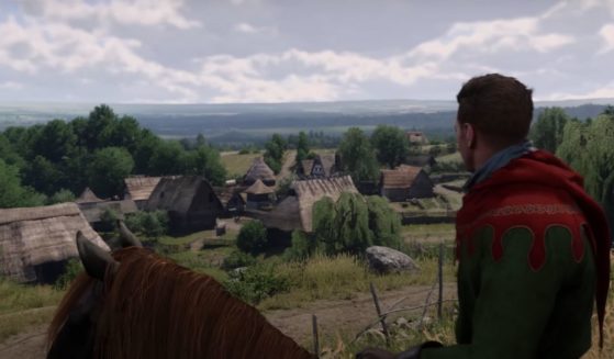 A character looking over a small town in the upcoming video game "Kingdom Come: Deliverance II."