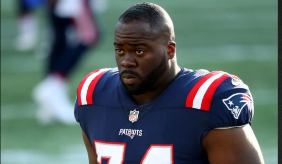 Korey Cunningham is seen in a file photo from October 2020, when he played for the New England Patriots. Cunningham was found dead in his home Thursday.