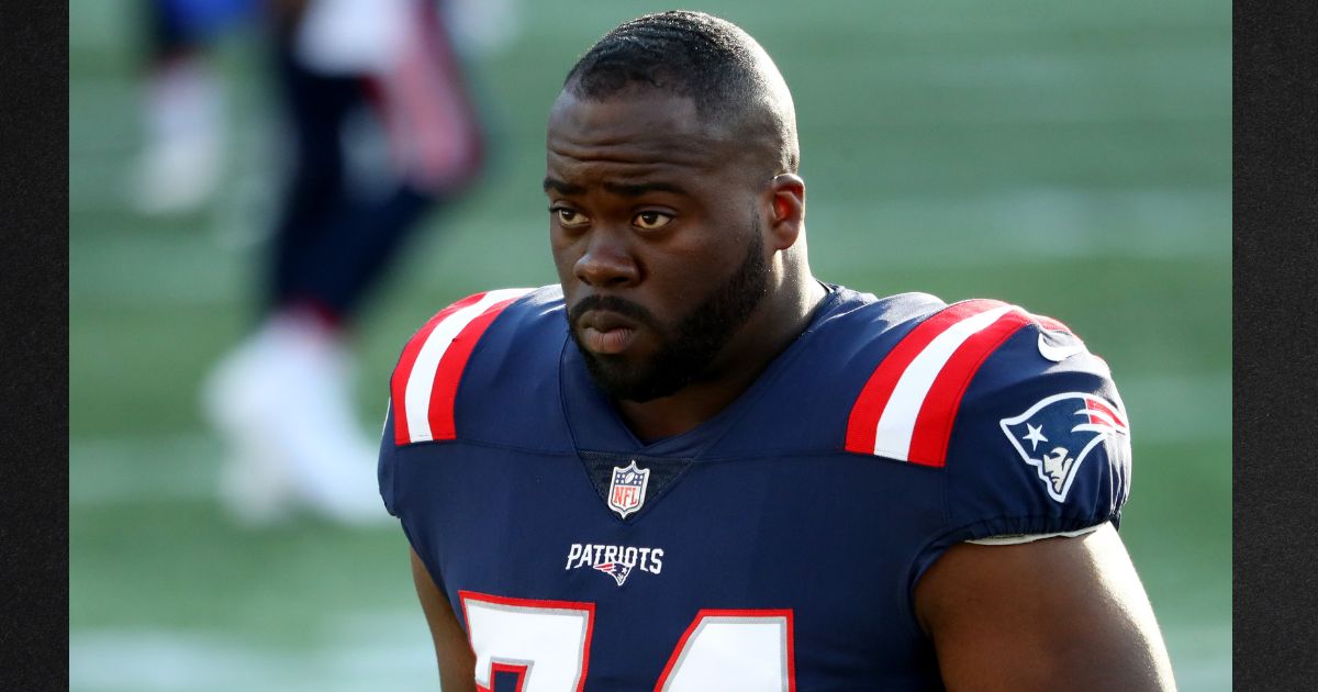 Korey Cunningham is seen in a file photo from October 2020, when he played for the New England Patriots. Cunningham was found dead in his home Thursday.