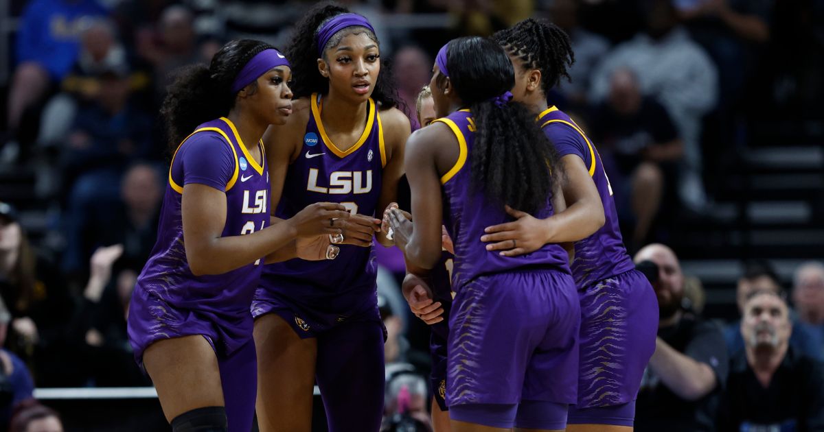 The LSU Tigers huddle during the first half against the Iowa Hawkeyes in the Elite 8 round of the NCAA Women's Basketball Tournament in Albany, New York, on Monday.