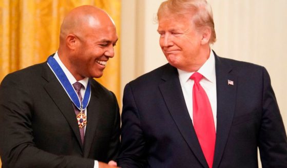 Then-President Donald Trump shakes hands with former New York Yankees pitcher Mariano Rivera after presenting him with the Medal of Freedom in the East Room of the White House in Washington, D.C., on Sept. 16, 2019.