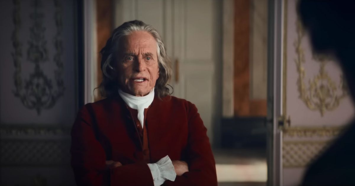 Michael Douglas with his arms crossed in a scene from the upcoming Apple TV+ mini series "Franklin."
