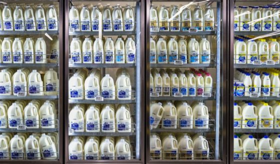 Milk is displayed in a fridge at a grocery store in Melbourne, Australia, on March 19.