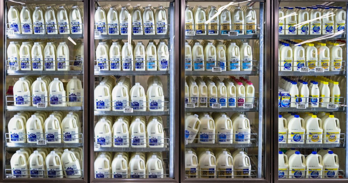 Milk is displayed in a fridge at a grocery store in Melbourne, Australia, on March 19.