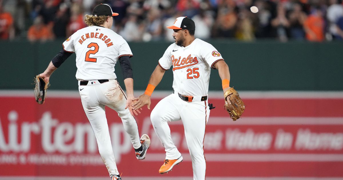 Gunnar Henderson and Anthony Santander of the Baltimore Orioles celebrate a win over the rival New York Yankees at Oriole Park at Camden Yards on Monday.