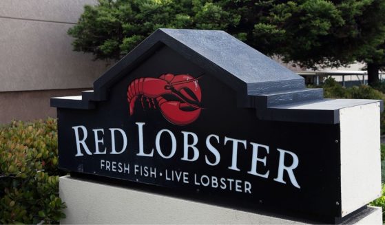 A sign is posted in front of a Red Lobster restaurant in San Bruno, California, in a file photo from 2014.
